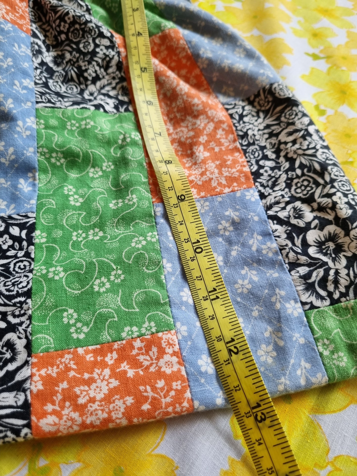 Patchwork Bag With White Floral Patterns