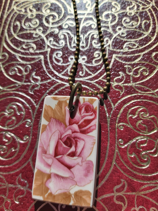 NEW Upcycled Ceramic Pendant - Pink Roses against a red and gold-detailed backdrop.