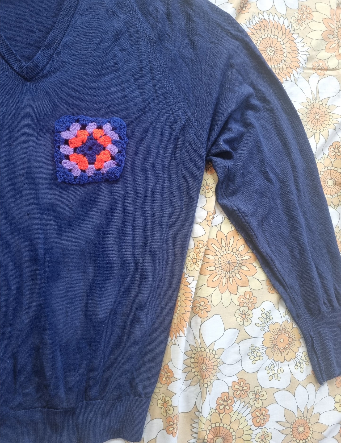 Visible Mending V-Neck Jersey With Granny Square Patch